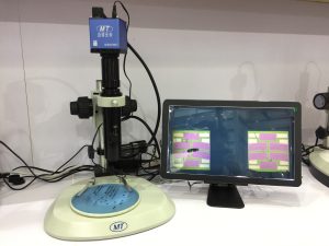 zoom lenses with coaxial illumination for wafer inspection